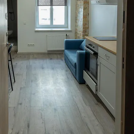 Tiny Brick Loft Апартаменты